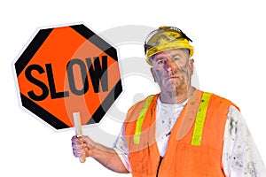 Construction worker holding a slow sign