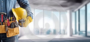 The construction worker holding a yellow helmet and tools in a modern workspace. AI generated image
