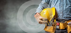 The construction worker holding a yellow safety helmet in a professional setting. AI generated image