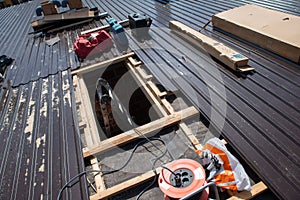 Construction worker installing a new roof