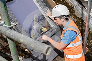 Construction Worker Installing Replacement Window