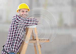 Construction Worker on ladder in front of construction site