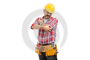 Construction worker looking at elbow