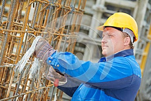 Construction worker making reinforcement photo