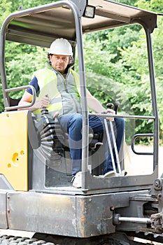 construction worker man drive excavator