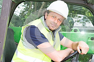 Construction Worker man driver at road construction site