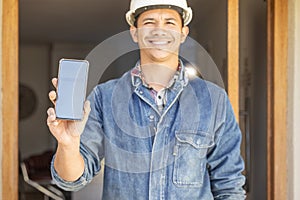 Construction worker, man in portrait and smartphone, screen with mockup and contact, digital marketing and handyman