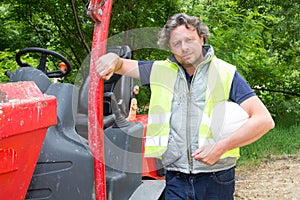 Construction worker man with Skid Steer