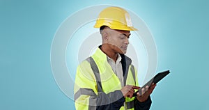 Construction worker man, tablet and thinking in studio for development, survey or planning by blue background. Builder