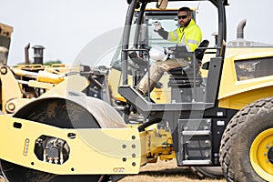 construction worker man used construction heavy machine equipment on building industry site for roadwork outdoor