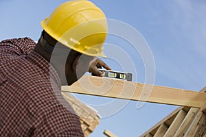Construction Worker Measuring Level