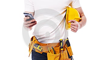 Construction worker with mobile phone
