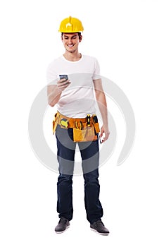 Construction worker with mobile phone