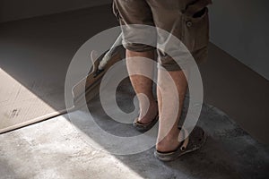 Self-leveling epoxy. Leveling with a mixture of cement floors photo