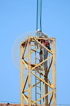 Construction worker on the part of a tower crane