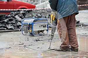 Construction worker with perforator