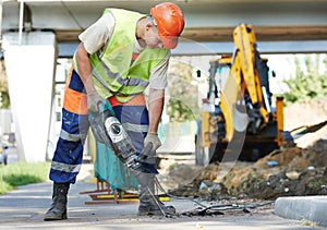 Construction worker with perforator