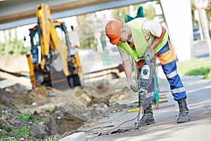 Construction worker with perforator