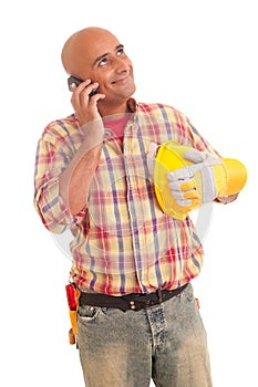 Construction worker at the phone