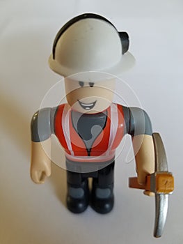 Construction worker with pickaxe
