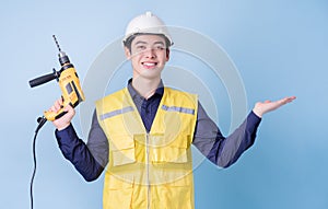 Construction worker portrait on blue background