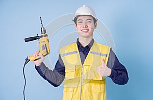 Construction worker portrait on blue background