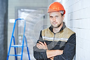 construction worker portrait indoors. Concept of building or service employee