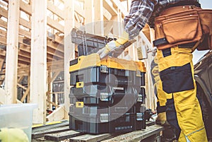 Construction Worker Preparing His Toolboxes