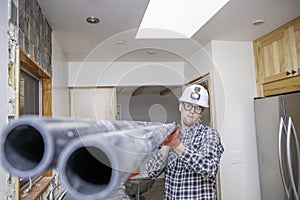 Construction worker with PVC pipe