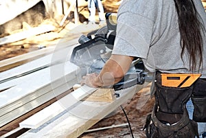 Construction Worker/Sawing