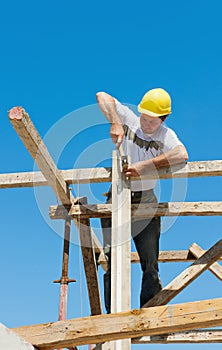 Construction worker on scaffold