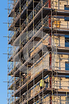 Construction worker on scaffold