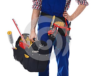 Construction worker with set of tools on white background