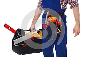 Construction worker with set of tools on white background,