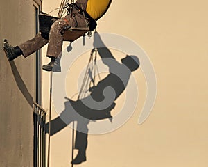 Construction worker shadow