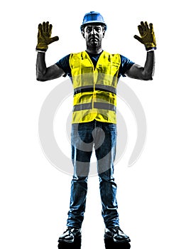 Construction worker signaling stop gesture silhoue photo