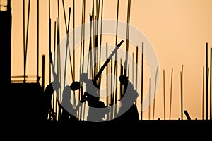 Construction worker silhouette on the work