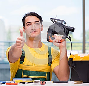 Construction worker sitting at the desk