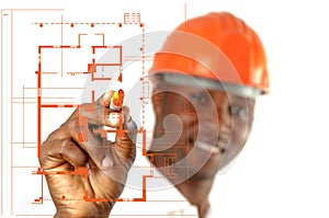 Construction Worker Sketching Blueprints photo