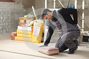 Construction worker suffering back ache