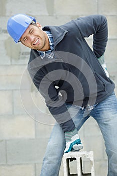 construction worker suffering from back injury