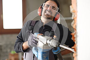 Construction worker is suffering backache after accident