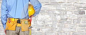 Construction worker with a tool belt.