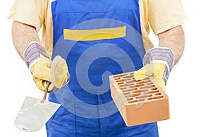 Construction Worker with Trowel and Brick with Clipping Path