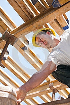 Construction worker under formwork girders photo