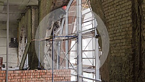 Construction Worker Using Drill To Install Window timelapse