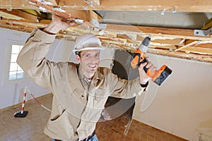 construction worker wear safety uniform installation ceiling work