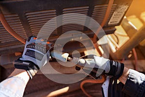 Construction worker wearing a heavy duty hand safety protection