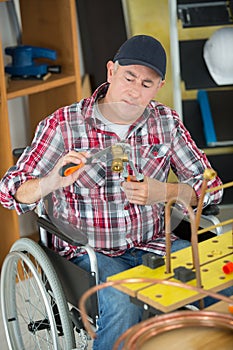 Construction worker in wheelchair