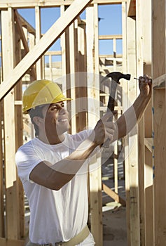 Construction Worker Working On Timber Frame